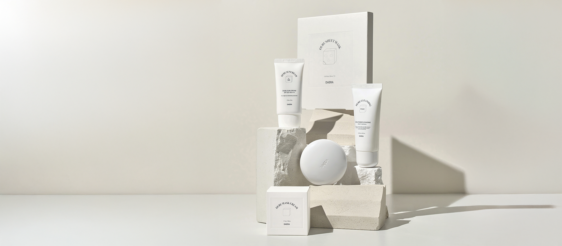 Skincare products and packaging on a white background